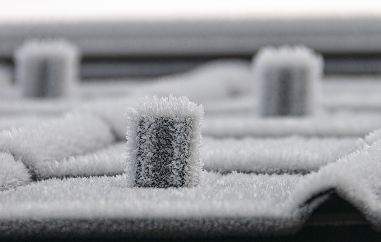 How Can You Safely Remove Ice or Snow from Your Roof?